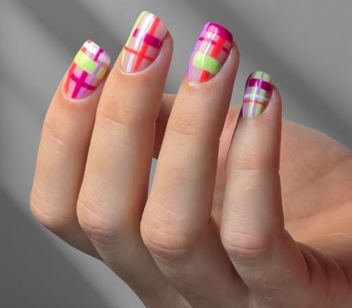 Pastel and neon plaid nail art in pink, lime and magenta